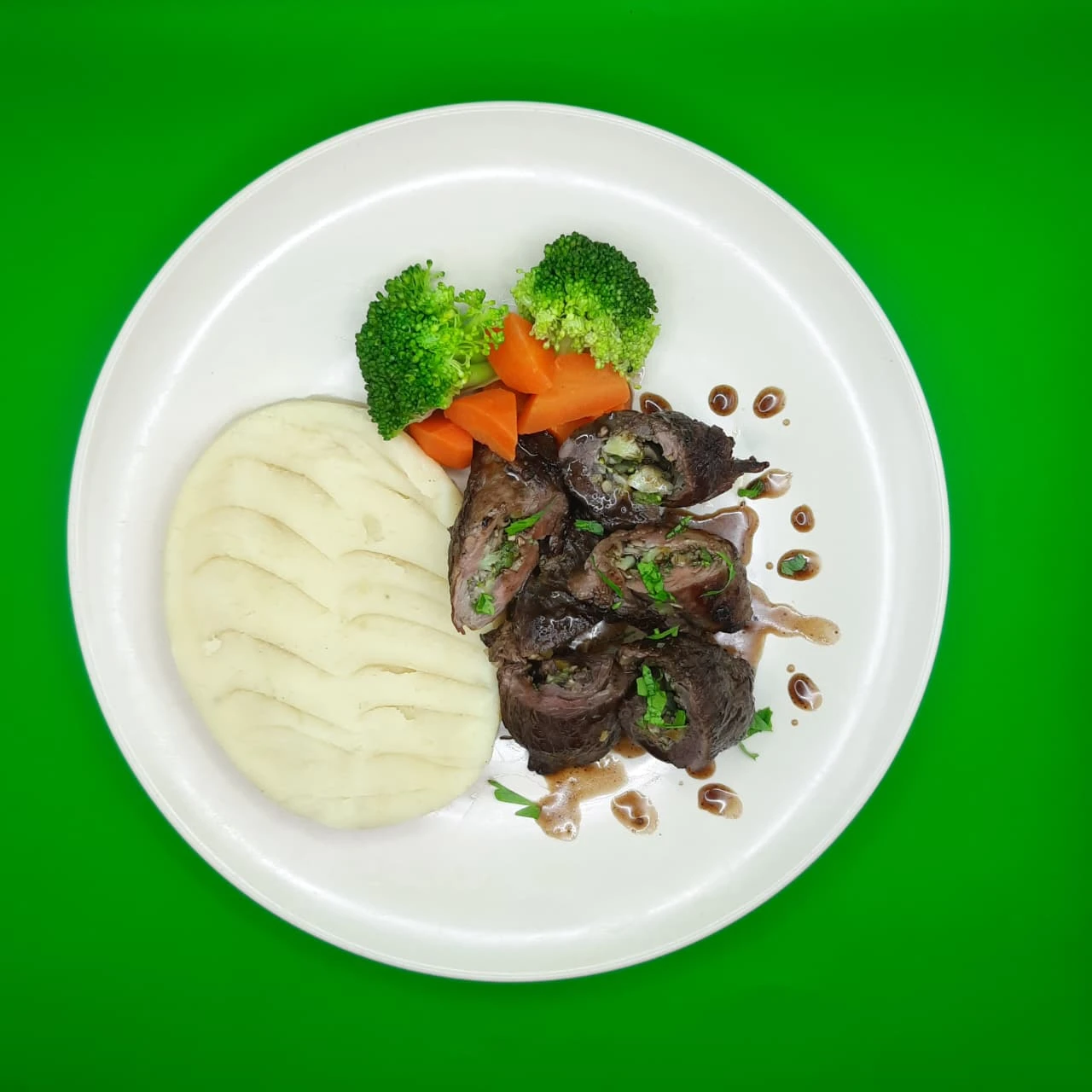 Stuffed beef roll with mashed potato